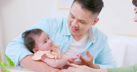 Sticker - Young parents play with baby