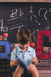 © Tamara Sales  - back to school kid pre k child in front of board chalk chalkboard a b c