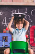 © Tamara Sales  - back to school kid pre k child in front of board chalk chalkboard a b c