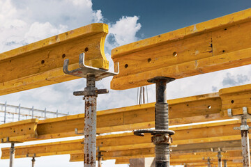 Formwork for pouring the second floor of a monolithic building. Reinforcement of walls and ceiling. Monolithic work during the construction of a building close-up. Construction technologies.