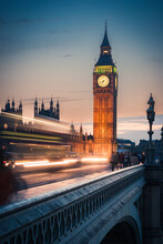 Big Ben At Dusk, London. An Early Evening View Over Westminster Bridge And Big Ben. Long Exposure With Intentional Motion Blur Of Passing Traffic.