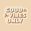 Good vibes only positive quote sticker in hippie retro 70s style with flowers. Vector illustration.