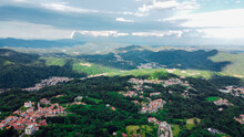 Aerial View Of The Alpine Foothills In Piedmont Region, Northwestern Italy. Green Hills In The Italian Alps.