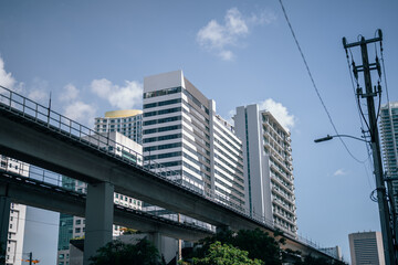 downtown city buildings sky Brickell bridge train transport miami 