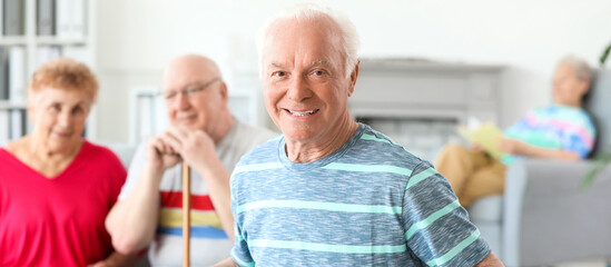 Wall Mural - Happy senior man in nursing home