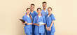 © Pixel-Shot - Group of medical students on light color background