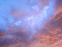 Radiant Blue And Purple Sunset Cloudscape