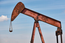 Rusty Oil Pumping Machine. Pump Jack. Petroleum Extraction. Global Warming