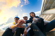 © Sky Stock - group of friends, Asian business team Architects and engineers and business women join hands.