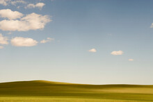 USA, Utah, Green Pasture And Clouds In Blue Sky