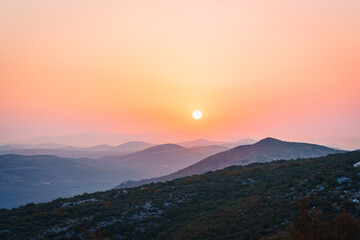 Poster - Mesmerizing view of a mountainous landscape at sunset in Split, Croatia