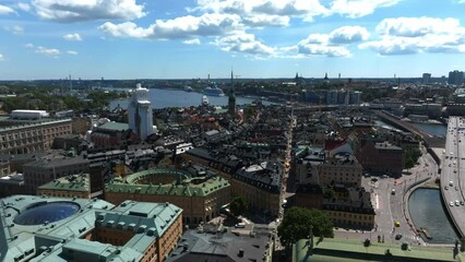 Wall Mural - Aerial view of the Stockholm old town - Gamla Stan cityscape near the City Hall top in Sweden. Beautiful summer time in Stockholm. Old town view.