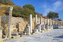 Historical Turkey Pillars Ephesus In An Ancient City. Excavated Remains Of Historical Building Stone In Turkish History And Culture. Ruin Of Ancient Roman Architecture In A Popular Tourism Attraction