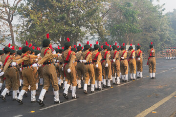 Wall Mural - RED ROAD, KOLKATA, WEST BENGAL / INDIA - 21ST JANUARY 2018 : India's National Cadet Corps's (NCC) lady cadets are marching past, preparing for India's republic day celebarion on 26.01.2018.