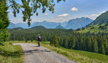 Nice, Active Senior Woman Underway With Her Electric Mountain Bike In The Bregenz Wald Near Dornbirn, VorarlbergAlps, Austria
