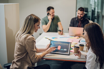 Wall Mural - Group of business people having a meeting in the office