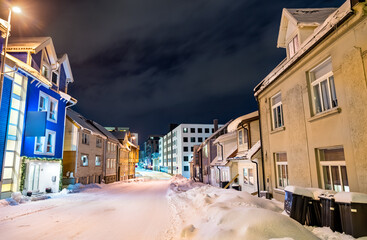 Sticker - Traditional houses in Tromso at a winter night in Polar Norway