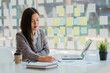 © ArLawKa - Asian business woman working on laptop computer in her workstation, startup, businessperson, employee, marketing concept, account, online finance, ecommerce, freelance.