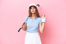 Young Golfer Player Man Isolated On Pink Background With Fingers Crossing And Wishing The Best