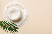 Summer Holidays. Summer Concept With Straw Hat And Tropical Leaf. Flat Lay, Top View, Copy Space