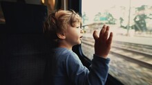 Small Boy Leaning On Window At Train Transportation
