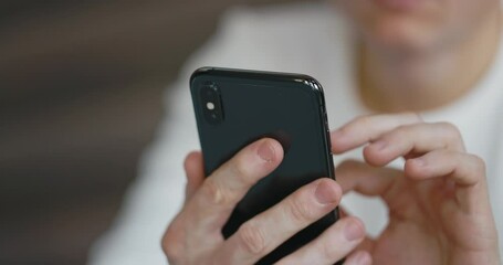 male hands close-up using the phone