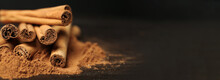 Aromatic Cinnamon Sticks And Powder On Table, Closeup View With Space For Text. Banner Design