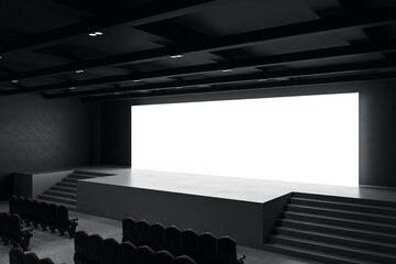 Perspective view on big blank white illuminated screen with place for your text or logo in empty huge hall with scene, stairs and rows of seats. 3D rendering, mock up