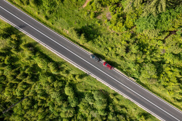 Wall Mural - Cars on forest road, top view