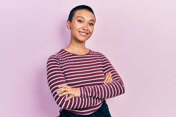 Sticker - Beautiful hispanic woman with short hair wearing casual striped sweater happy face smiling with crossed arms looking at the camera. positive person.