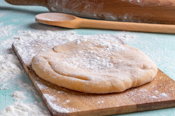 Wall Mural - Preparing dough for bakery. Ravioli dough and flour