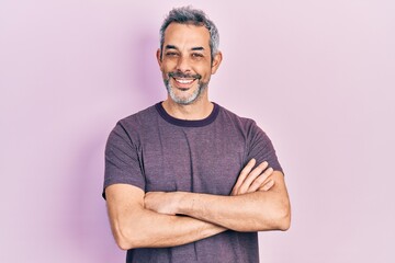 Sticker - Handsome middle age man with grey hair wearing casual t shirt happy face smiling with crossed arms looking at the camera. positive person.