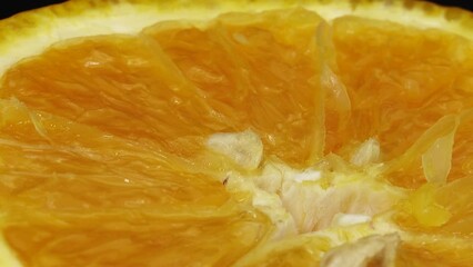 Wall Mural - 4K Macro shot of navel orange fruit and rotate.Close up fresh citrus orange  background 4K UHD video