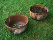 Two old iron pots.