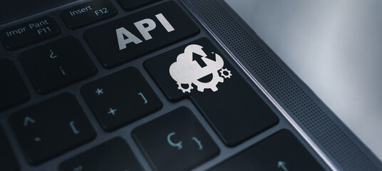 Banner of laptop keyboard with API acronym word icon concept. Application Programming Interface. Software Development. 