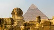 Closeup shot of a Great Sphinx between the ruins with the Cheops Pyramid in the background