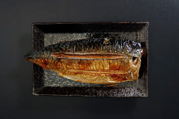 Wall Mural - Grilled fish dish mackerel on the table