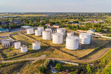 Tanks With Petroleum Products Are Among Fields Near The Village. The View From The Top. Aerial View.