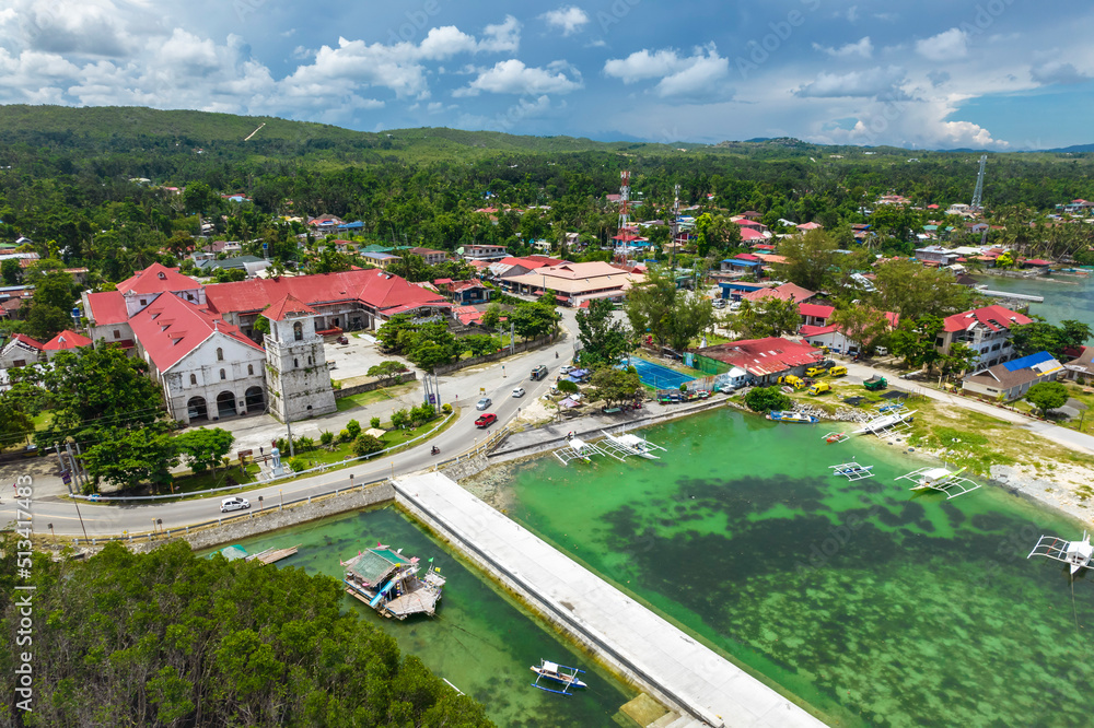 Baclayon, Bohol, Philippines - Aerial of Baclayon Church, the town center and fish port. Stock Photo | Adobe Stock