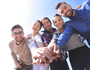 Wall Mural - College Students Teamwork Stacking Hand Concept