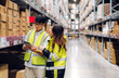 © Art_Photo - Asian two engineer team shipping order detail on tablet check goods and supplies on shelves with goods background inventory in factory warehouse.logistic industry and business export