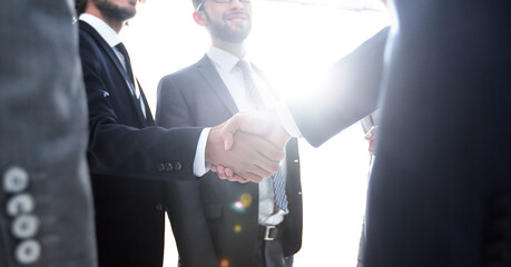 Fototapete - business people handshaking after good deal.