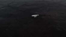 4k Aerial drone view of DC-3 plane wreck, crash on Solheimasandur in Iceland