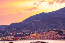  Menton, France, Provence-Alpes, Cote D'Azur. Evening Panoramic View Of The Colorful Old Town At Sunset In Summer. Beautiful Houses In The Old Part Of The French Riviera