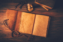 Blank Antique Leather-bound Journal, Book Or Diary With Old Books And Candle