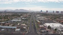 Aerial Shot Of Busy Las Vegas Street With Casino City Skyline In Background