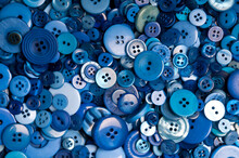 Background Pattern Of Blue Buttons Of Various Size
