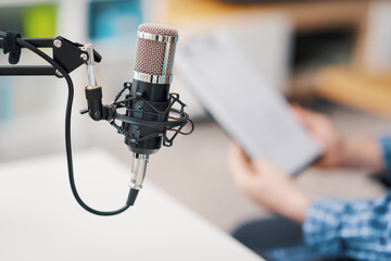 Professional speaker checking the podcast schedule