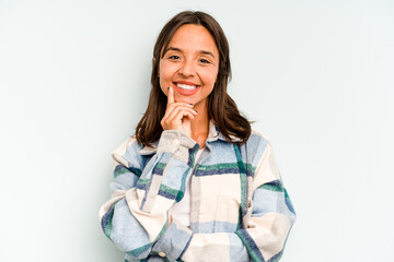 Wall Mural - Young hispanic woman isolated on blue background biting fingernails, nervous and very anxious.