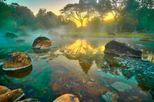 Hot Springs Onsen Natural Bath At National Park Chae Son, Lampang Thailand.In The Morning Sunrise.Natural Hot Spring Bath Surrounded By Mountains In Northern Thailand.soft Focus.